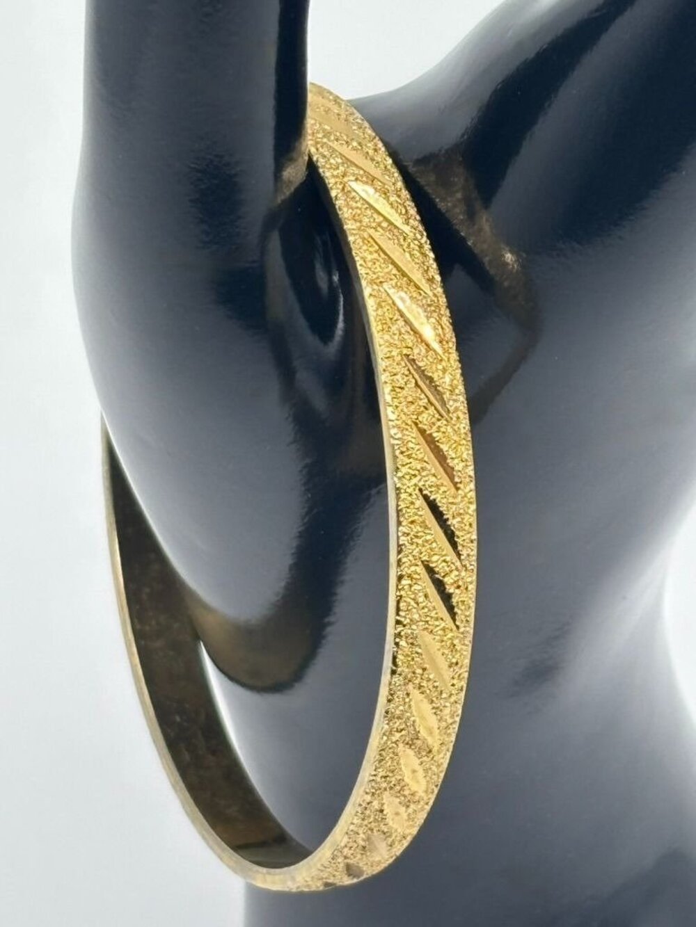 Vintage Monet Etched Textured and Shiny Gold-Tone Bangle Bracelet Signed 8-1/8"